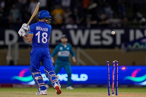 Ibrahim Zadran is bowled by Matt Henry